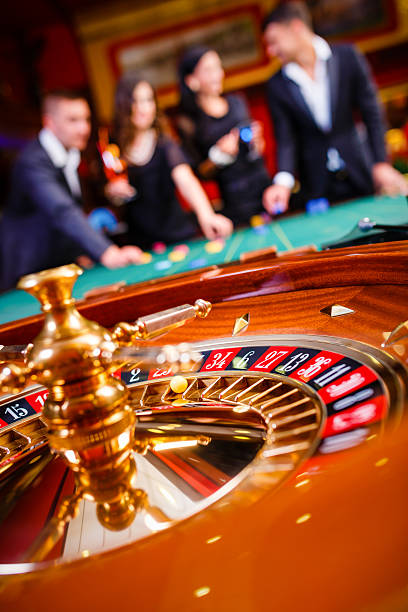 BandarQ table lobby on ligaprofit showing multiple table options and betting limits